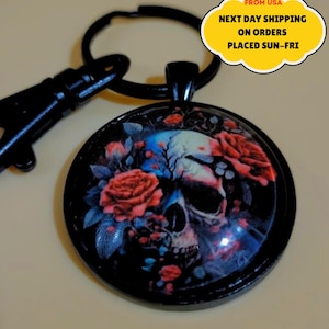 Skull and Roses 30mm Glass Cabochon Black Keychain with split ring and lobster clasp.