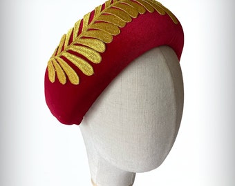 Red velvet trimmed with gold fern leaf headband