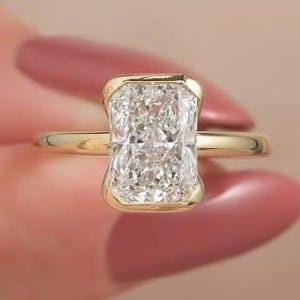 14K Gold Radiant Cut Moissanite Engagement Ring: Half Bezel East-West Setting