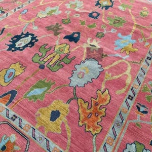 Handmade Pink Oushak Rug: New Zealand Wool, Contemporary Floral Design