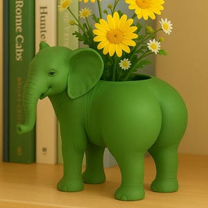 May include: A green elephant-shaped planter holding yellow and white daisies. The planter is a solid, matte green color and has a whimsical design. The flowers add a pop of color to the decorative piece.