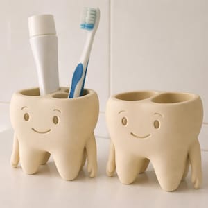 Soporte para cepillo y pasta de dientes con diseño de molar sonriente – 2 diseños STL (descarga digital)