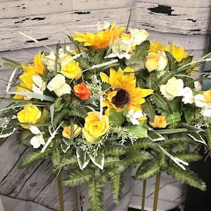 Sunflower saddle arrangement, sunflower arrangements, Gravesite arrangements, Funeral arrangements, Memorial cemetery Tombstone arrangement