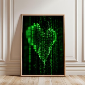 Peut inclure: Une œuvre d'art murale encadrée rectangulaire présentant un design matriciel numérique. L'image affiche un fond noir avec des flux verticaux de chiffres en code binaire vert brillant formant la forme distincte d'un cœur au centre.