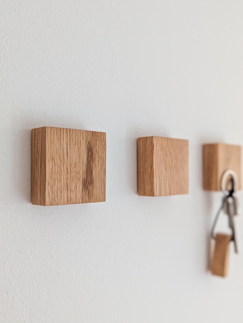 Handmade oak wood key rack – invisible magnets for stylish hallway or office key storage.