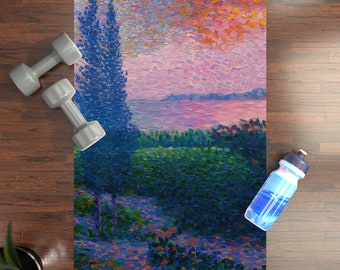 May include: A yoga mat with a colorful landscape painting. The painting features a blue sky with pink clouds, a lake, and trees. The mat is perfect for yoga, pilates, or stretching.