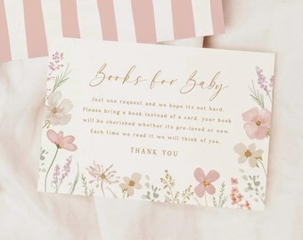 Op de afbeelding: Een rechthoekige kaart met een crèmekleurige achtergrond en roze en groene bloemenillustraties. De tekst luidt: Books for Baby. Just one request and we hope its not hard. Please bring a book instead of a card, your book will be cherished whether its pre-loved or new. Each time we read it we will think of you. THANK YOU.