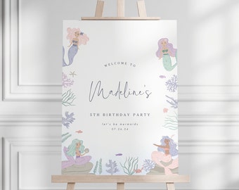 May include: Welcome to Madeline's 5th Birthday Party, let's be mermaids 07.26.24. A white sign with a mermaid theme, featuring illustrations of mermaids with purple, pink, and blue colors, and sea life.