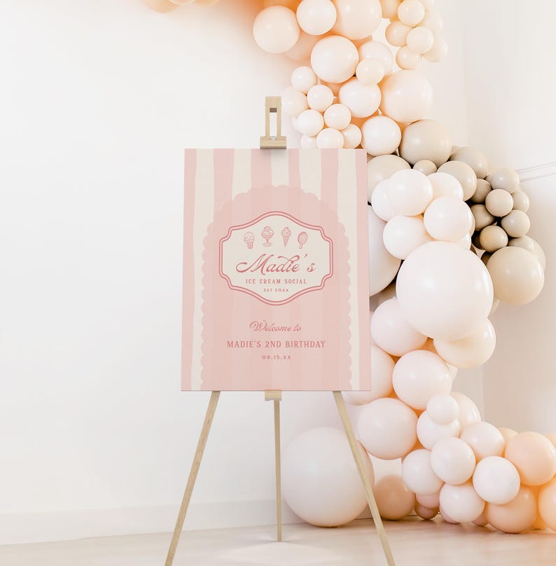May include: Pink and white striped welcome sign with the text "Madie's Ice Cream Social" and "Welcome to Madie's 2nd Birthday 06.12.23".
