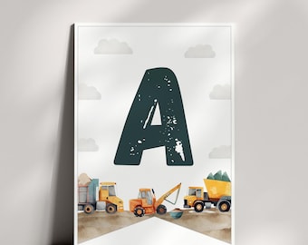 May include: A vertical wall art print featuring a large, dark green letter A with a distressed texture. Below the letter, three yellow and orange construction vehicles, including a dump truck and an excavator, sit on a brown dirt ground.