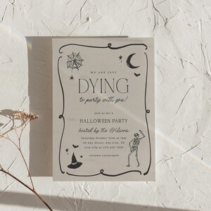 May include: Halloween party invitation with a light gray background and black text and illustrations. The invitation reads "We are just dying to party with you!" and includes details for a Halloween party, including the date, time, and location.