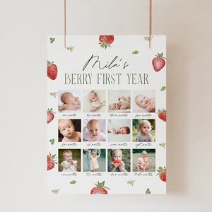 May include: A baby milestone poster, featuring the text "Mila's Berry First Year." The poster has twelve photo slots, each labelled with a month, and is decorated with strawberry and floral illustrations. It's designed to display a baby's monthly photos, a lovely keepsake.