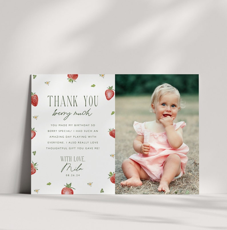May include: A thank you card with a photo of a baby girl in a pink dress. The card features a strawberry pattern and the text "THANK YOU berry much" with a personal message and the date 08.26.24.
