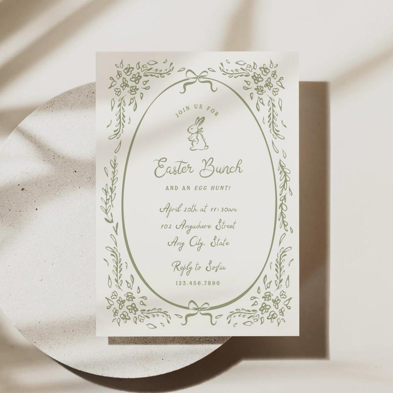 May include: A green and white invitation card with a floral border and a bunny rabbit illustration. The text reads "Join us for Easter Bunch and an egg hunt!" with the date, time, address, and contact information.