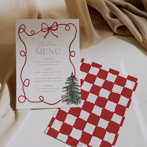 May include: A Christmas menu card with a red bow design and the words "Christmas MENU". The menu includes starters, entrees, and dessert options. A red and white checkered card is next to the menu.
