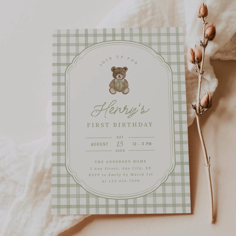 May include: A baby's first birthday invitation with a light green gingham pattern background. The invitation features a teddy bear illustration and the text "Henry's First Birthday" with date and time details.