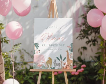 May include: Welcome to Olivia's 4th Birthday party sign with a jungle animal theme. The sign features a pink elephant, a giraffe, a zebra, a tiger, and a flamingo. The sign is on an easel.