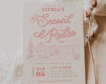 May include: A pink and white invitation for a second birthday party with a western theme. The invitation features a lasso design with the words "Sophia's Second Rodeo" and a cartoon drawing of a desert landscape. The invitation includes the date, time, and location of the party.