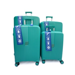 May include: A collection of four teal-coloured rolling suitcases in different sizes. Each suitcase features a retractable handle and a tag with icons. The cases have a textured surface and four wheels for easy movement.