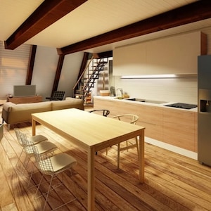 May include: A modern kitchen and dining area with a wooden table and chairs. The kitchen features white cabinets, a stainless steel sink, and a wood countertop. The dining area has a large wooden table with four chairs. The room has a wood floor and a vaulted ceiling with exposed beams.