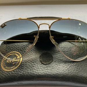 Unique Ray Ban Outdoormen in titanium and gold