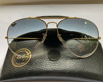 Unique Ray Ban Outdoormen in titanium and gold