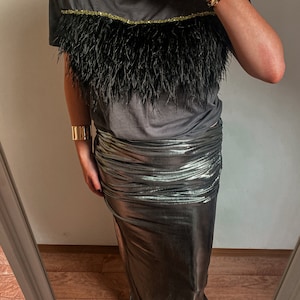 Oversize t-shirt with feathers