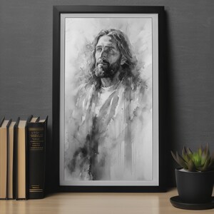 May include: A black and white watercolor painting of a man with long hair and a beard. The man is looking up and to the right. The painting is framed in a black frame.