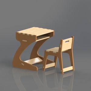 May include: A wooden desk and chair set for children. The desk has a curved design and a small shelf. The chair has a simple design with a back and four legs.