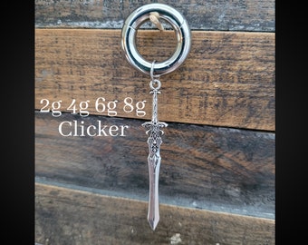 May include: A silver clicker with a sword charm. The clicker is available in sizes 2g, 4g, 6g, and 8g.
