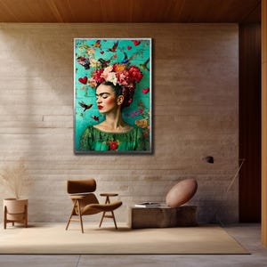 May include: A framed portrait of a woman with a floral headdress, red lips, and a green dress. The background is teal with red hearts and birds. The artwork is displayed on a textured wall.