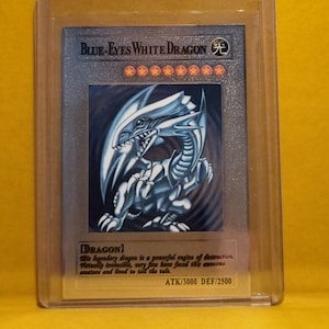 Carte Dragon blanc platine yeux bleus
