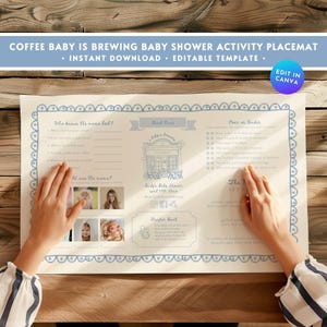 Puede incluir: Un mantel individual de actividades para baby shower con el texto "COFFEE BABY IS BREWING BABY SHOWER ACTIVITY PLACEMAT". El diseño incluye un borde azul claro y elementos decorativos. El mantel individual tiene secciones para juegos y actividades.