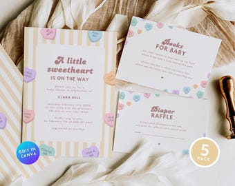 May include: A set of five printable baby shower cards with a candy heart theme. The cards are yellow and white striped with pink, blue, and purple candy hearts. The text on the cards reads "A little sweetheart is on the way", "Books for Baby", "Diaper Raffle", "Charm Me", and "You & Me".