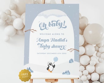 May include: A blue and white baby shower welcome sign with a penguin holding a balloon. The sign says "Oh baby!" and "Welcome along to Anya Hadid's Baby Shower" with the date "Saturday December 6th 20XX".