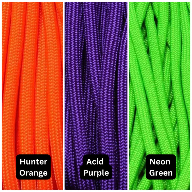 May include: Three spools of paracord in different colors: hunter orange, acid purple, and neon green. The spools are labeled with the color names.