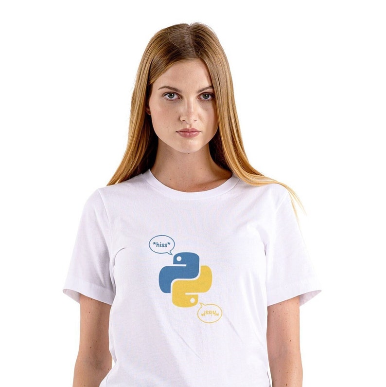May include: White t-shirt featuring the Python programming language logo in blue and yellow, with speech bubbles saying "hiss" and "sssh". The shirt is a short-sleeved crew neck.
