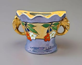 Blue and Peach Lusterware Hand Painted Wall Pocket with Elephant Head Handles