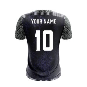 May include: Black and white soccer jersey with a patterned design. The jersey has the text "YOUR NAME" and the number "10" on the back.
