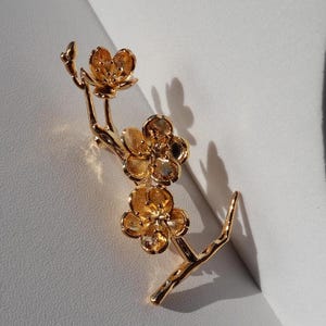 Cherry Blossom Brooch: Gold Flower Branch Pin with Cubic Zirconia