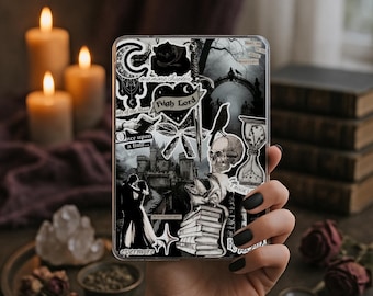 May include: A clear phone case featuring a collage of black and white gothic-themed stickers. The stickers include a skull, a castle, a rose, and text that reads "High Lord" and "evermore". The case is held in a hand with black nail polish.