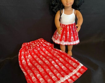 Handmade skirt for 18 inch doll and includes a matching skirt for your little girl! Size 10/12. Red with gift box print