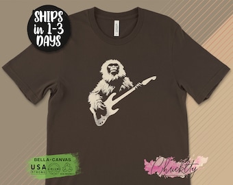 Arctic Snow Monkey Playing Electric Guitar T-Shirt, Funny Musician Graphic Tee, Rock Music Lover Shirt, Unique Animal Art Design Shirt