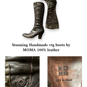 May include: A pair of brown leather knee-high boots with a chunky heel. The boots have a decorative buckle and multiple buttons on the shaft. The boots are made by MOMA and are 100% leather.