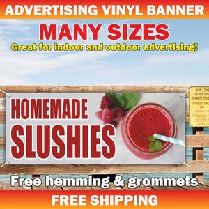 May include: A rectangular vinyl banner featuring the text ADVERTISING VINYL BANNER, MANY SIZES, Great for indoor and outdoor advertising!, HOMEMADE SLUSHIES, Free hemming & grommets, and FREE SHIPPING. A red berry slushy in a glass is displayed.