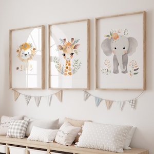 Conjunto de 3 ilustraciones boho de animales para habitaciones infantiles: león, jirafa, elefante como carteles en descarga digital