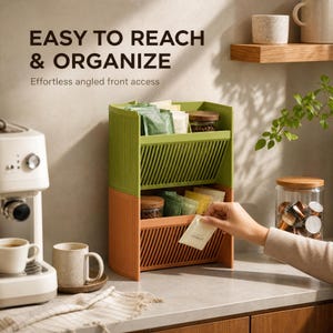 Tilt Stack stackable angled storage in green and orange; compact shelf bin and desk bin with front-angled slots.