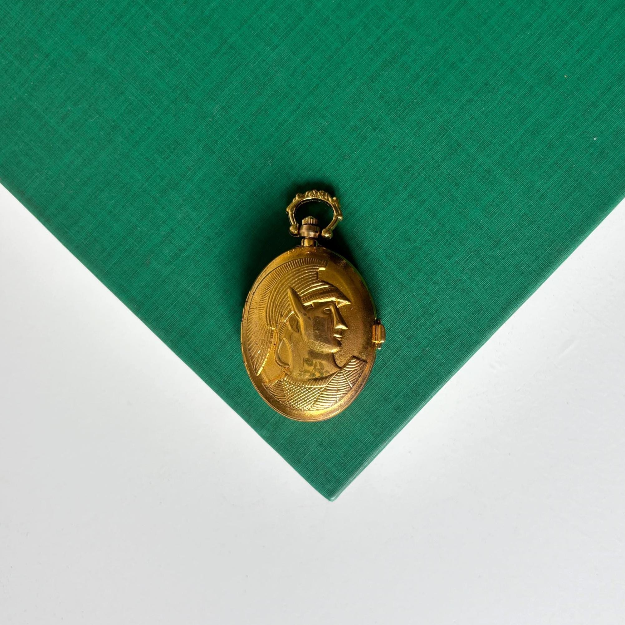 Vintage Gold Tone Quartz Pocket Watch Hidden Dial Roman Numerals Locket Style