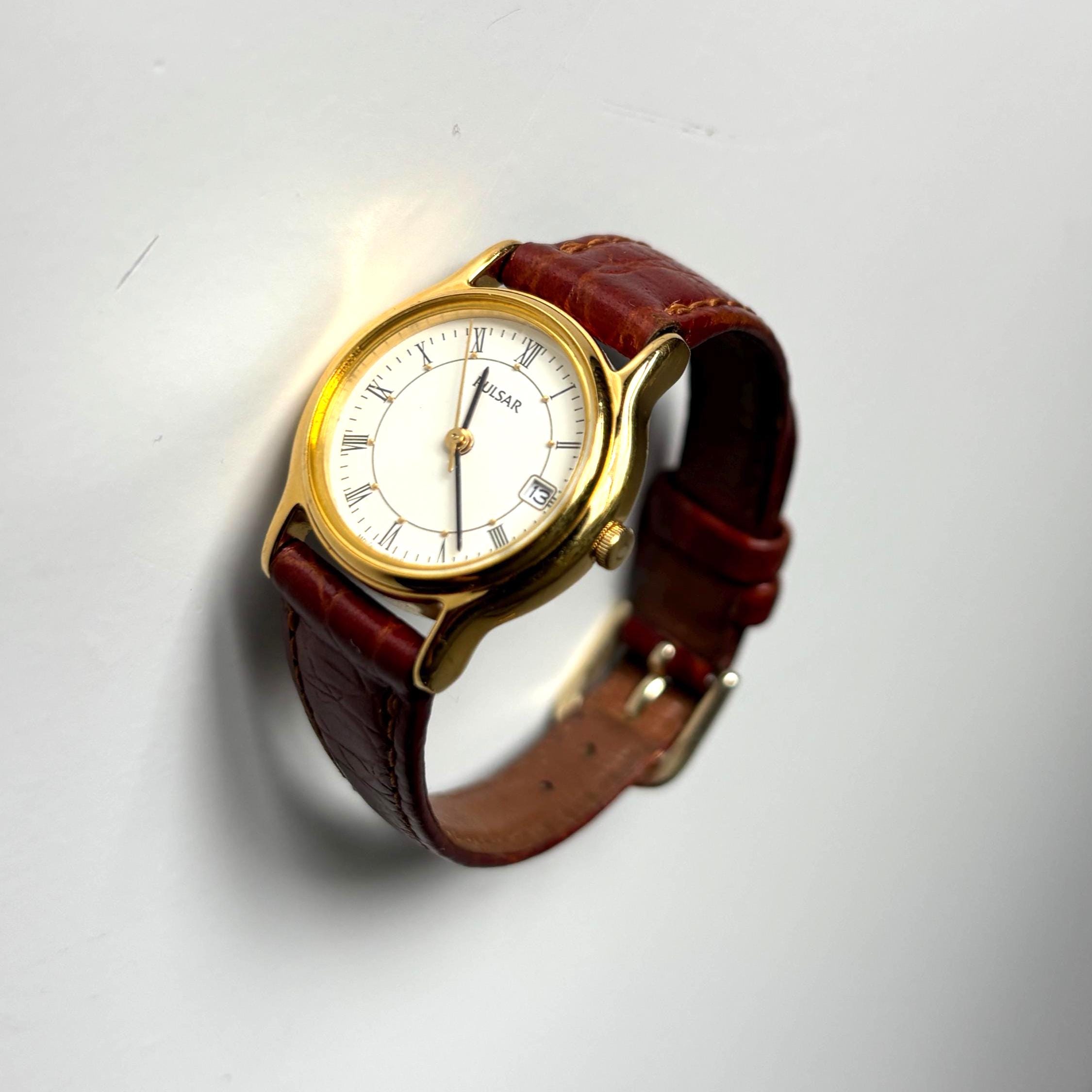 Vintage Pulsar V782-X088 Ladies Quartz Watch Working Roman Numeral Dial Date Display January 1996