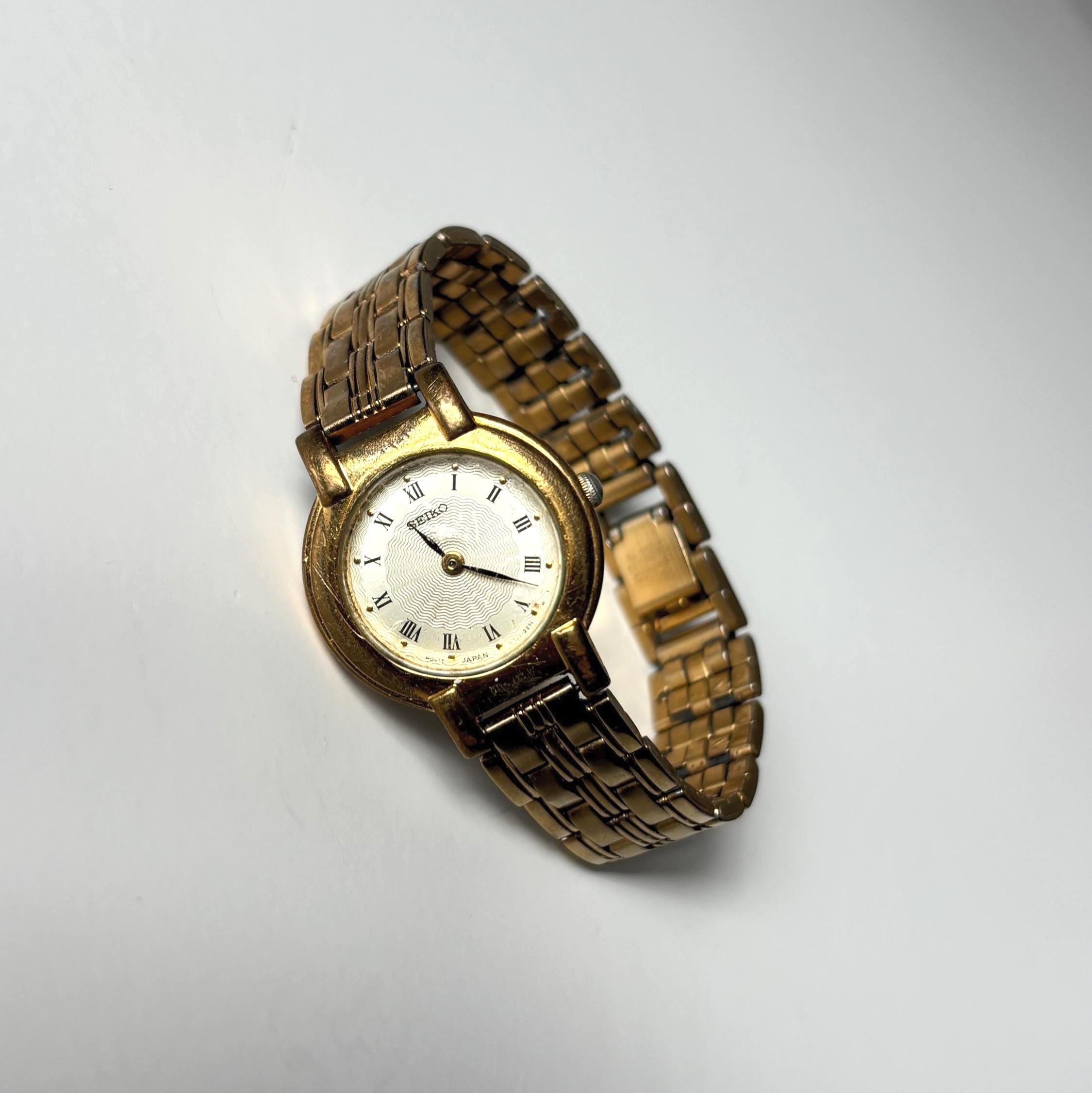 Vintage Seiko Ladies Quartz Watch Working Gold Tone Bracelet Roman Numeral Dial Dress Watch